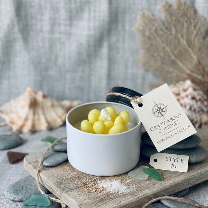 Candle with a tag labeled &