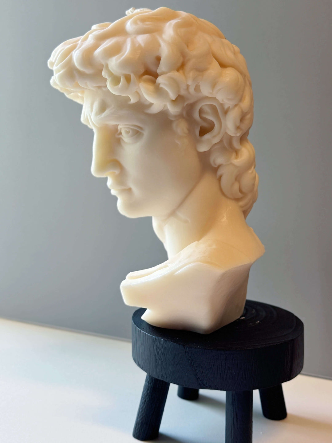 Large David Head Sculptural Candle in clean-burning wax, inspired by Michelangelo’s Renaissance masterpiece.