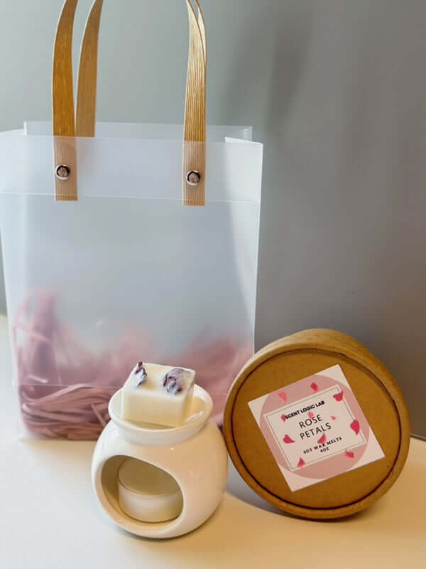 Rose Petal Wax Melter Gift Set featuring ceramic melter, soy wax melts, and a chic bag for stylish gifting.