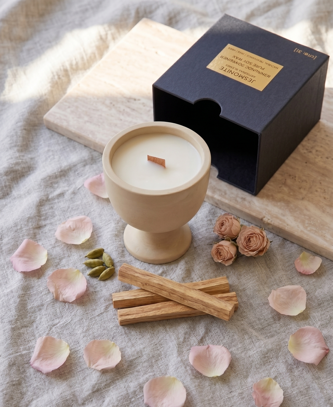 Jesmonite container candle with wooden wick.