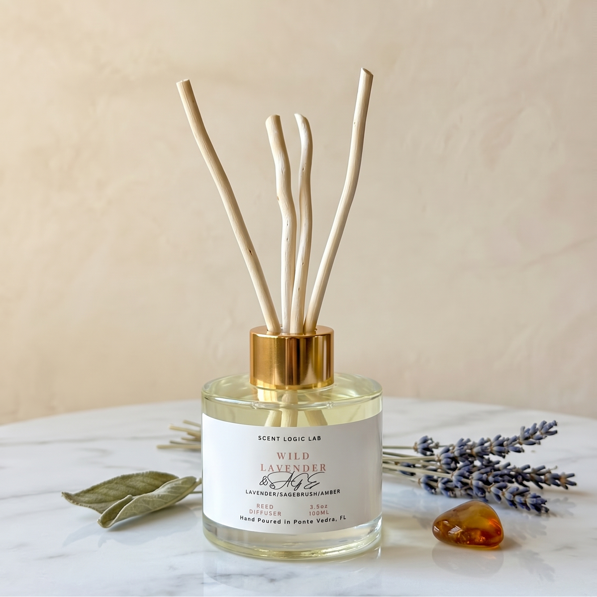 Wild Lavender Reed Diffuser 100ml glass vessel with gold cap and natural wooden reeds, hand-poured home fragrance