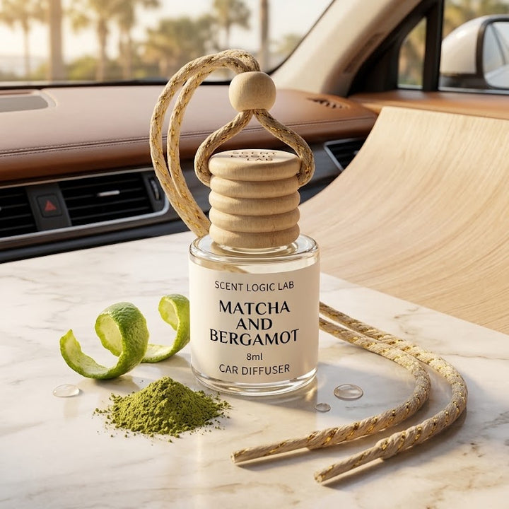 A car diffuser bottle labeled &
