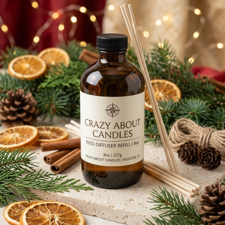 An amber glass reed diffuser refill bottle with a black cap and a cream label reading &