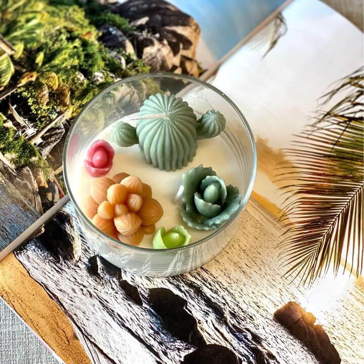Scented candle with garden terrarium design