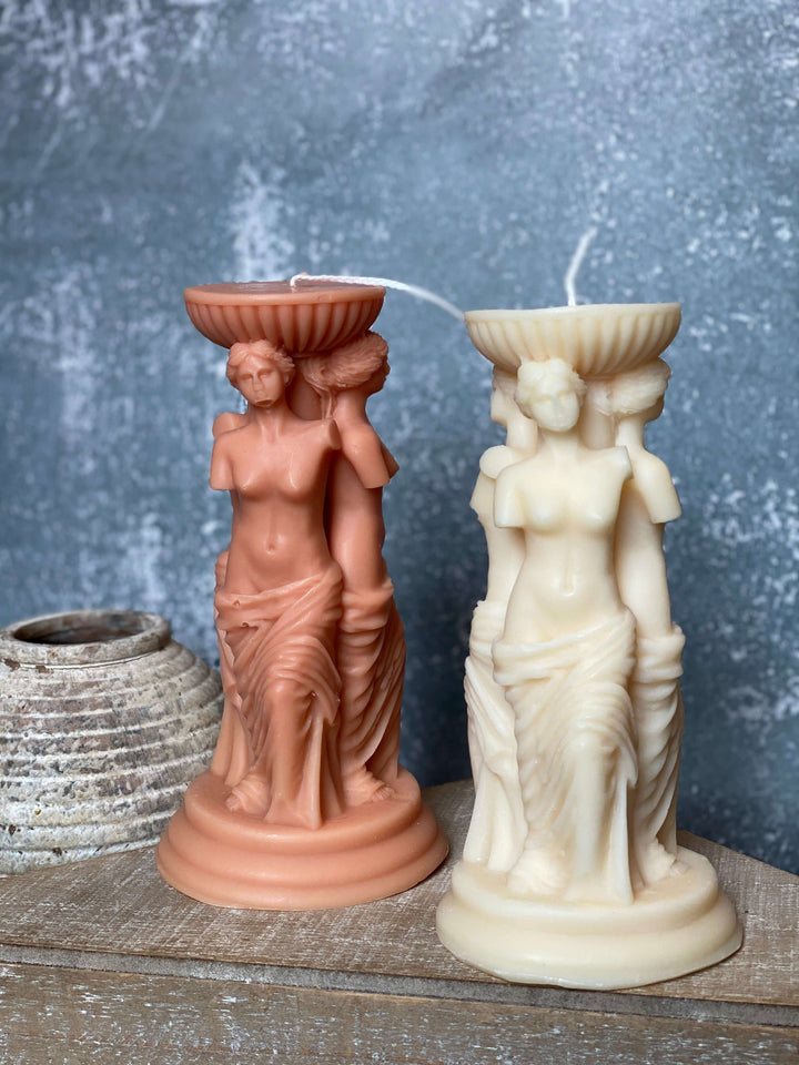 Feminine body sculpture candle trio
