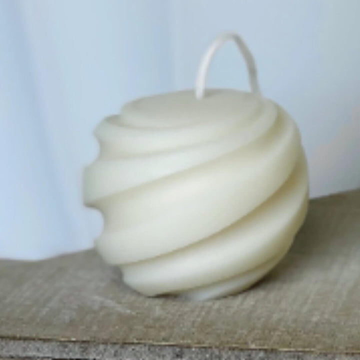 Decorative swirl shaped soy candles