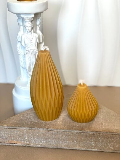 Modern candle with origami sculpture look