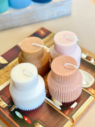 Ribbed pedestal pillar candle